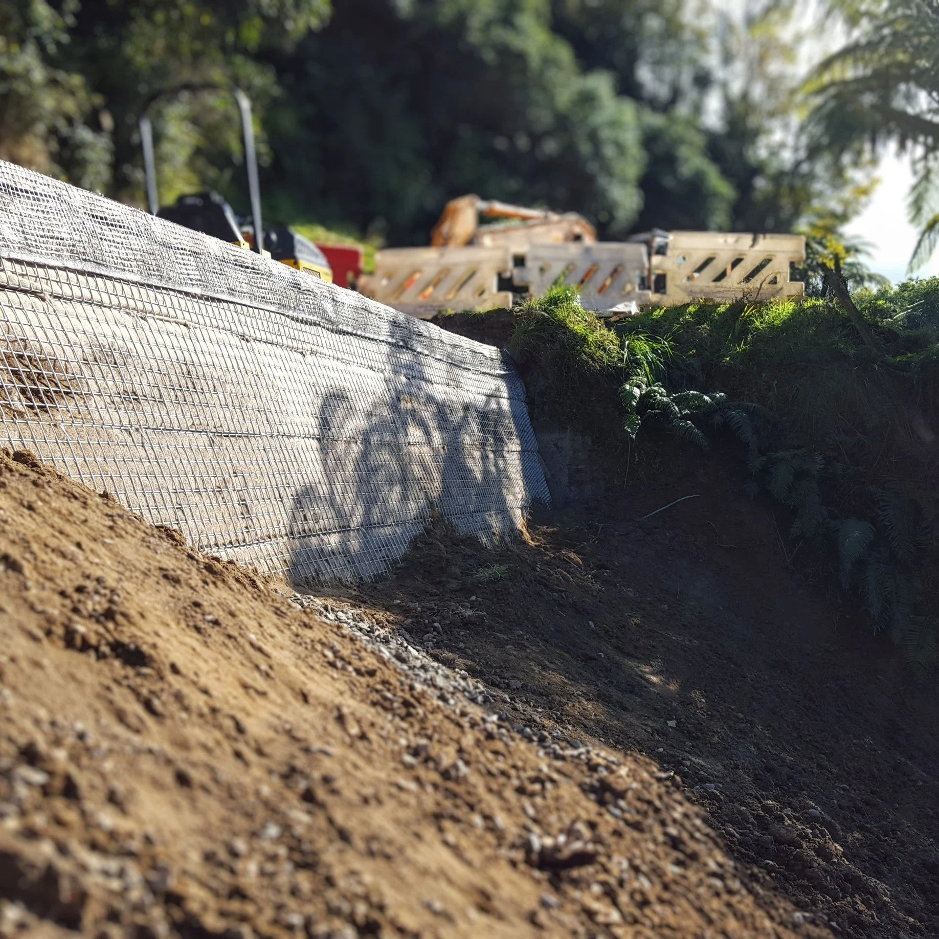 Retaining wall repairs of underslip from flood damage