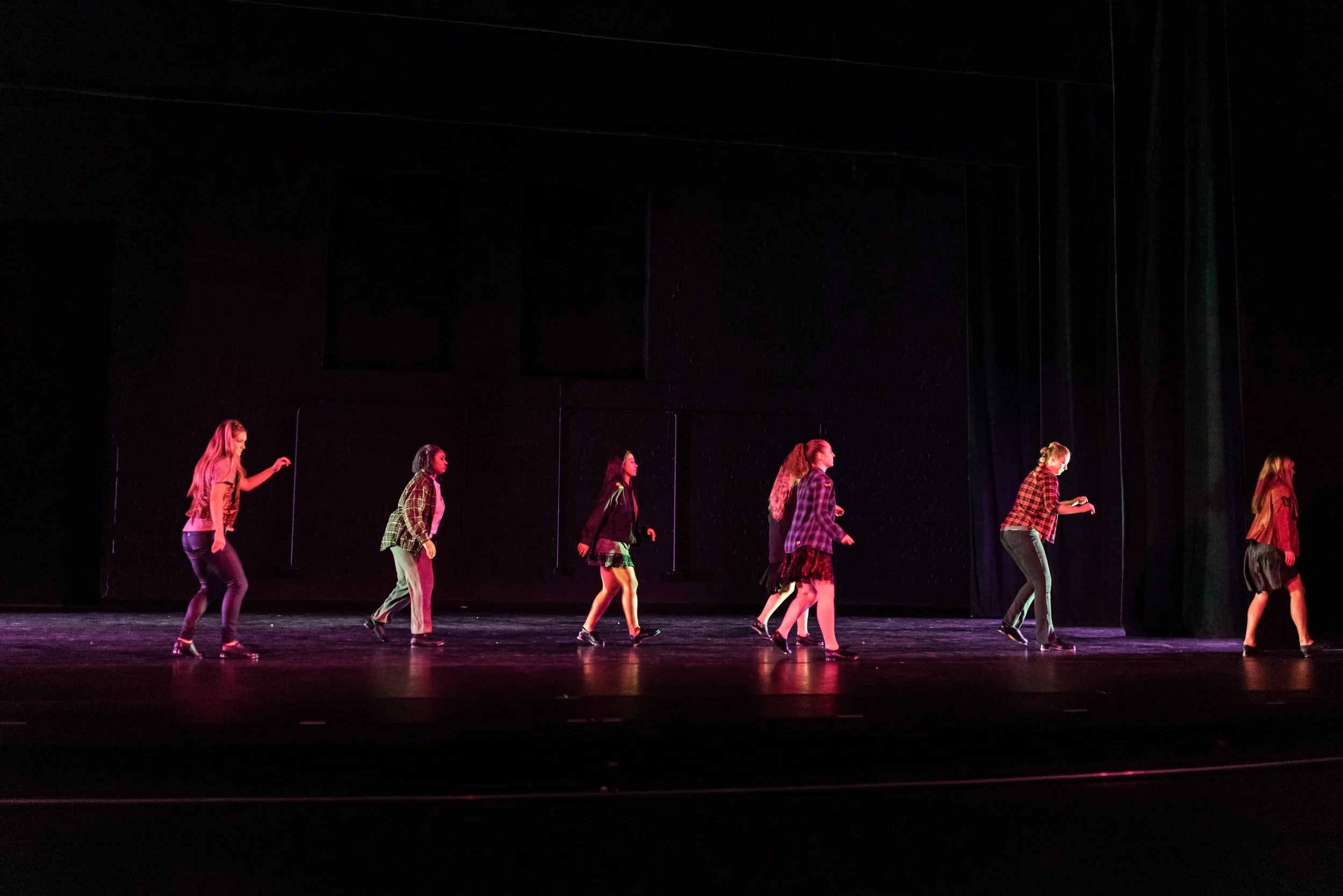 Dancers turned towards the wings