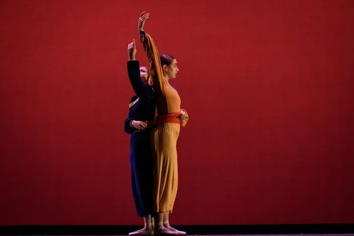 Dancers bound together