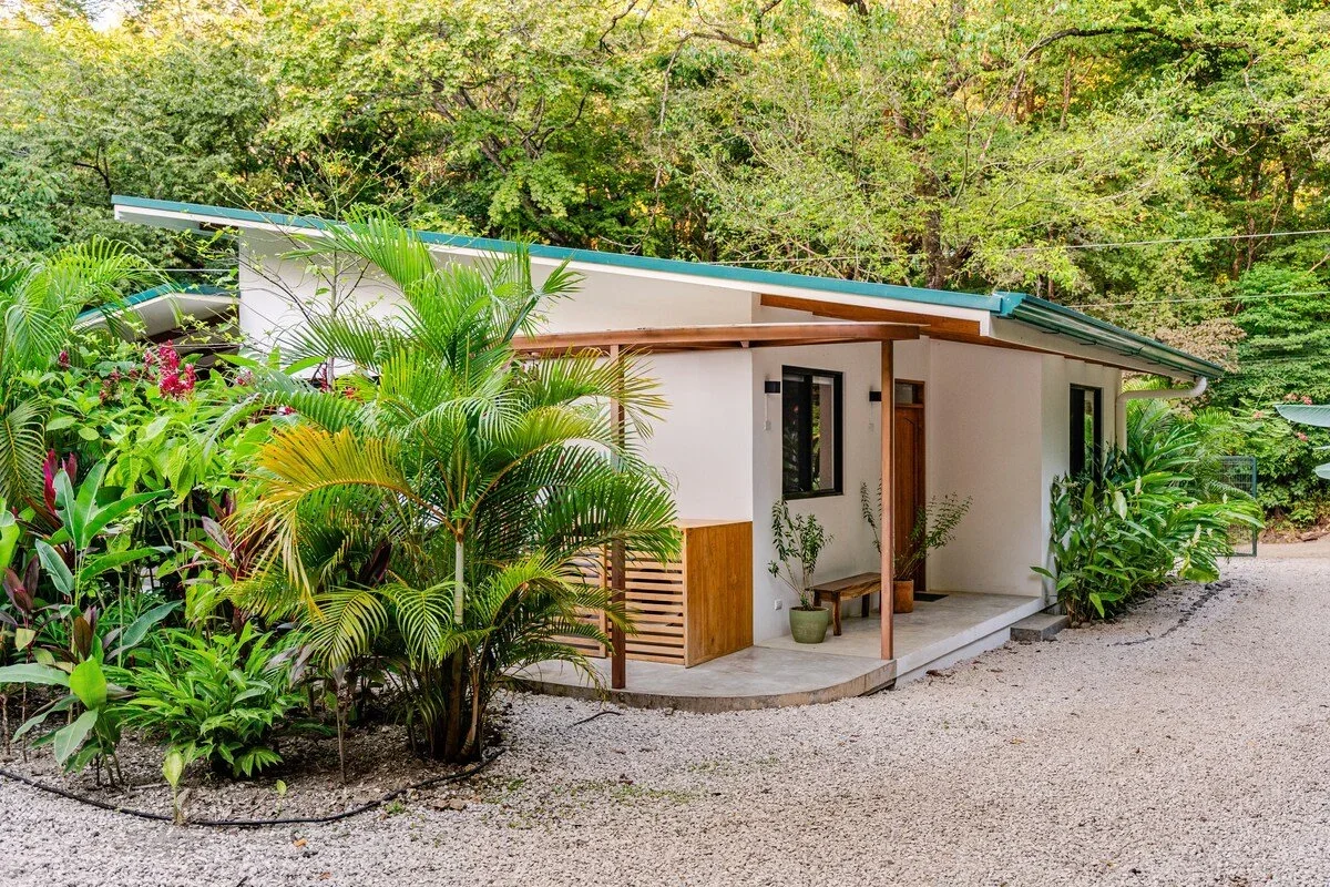 white home for sale in nosara surrounded by jungle