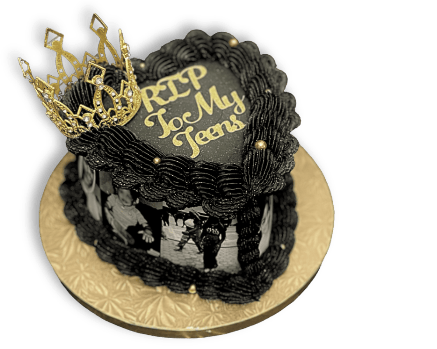 A black birthday cake with black frosting and gold accents, topped with a gold crown and a heart-shaped plaque that reads 'RIP To My Tears', with a photo collage around the sides, placed on a gold tray.
