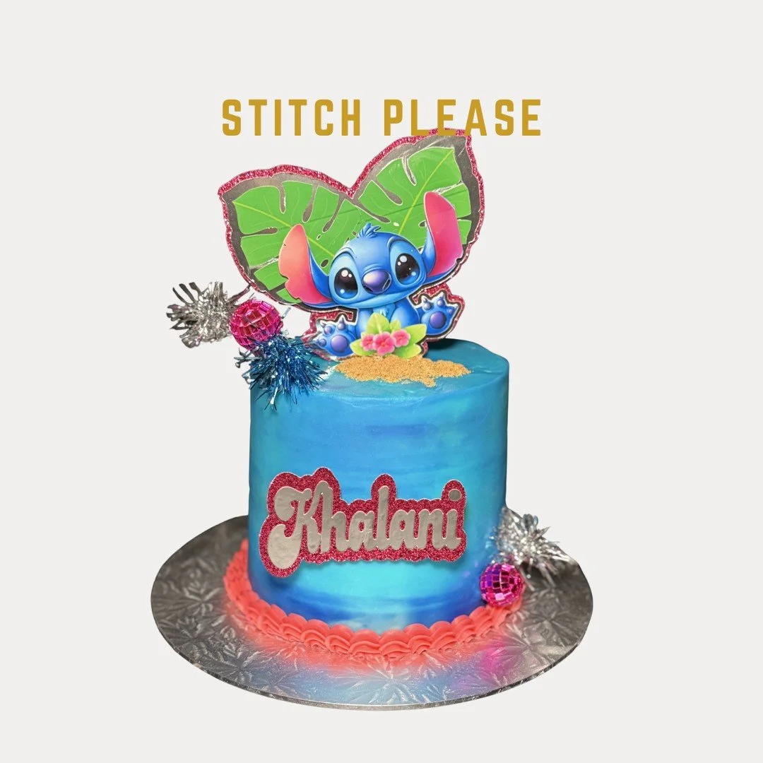 Blue birthday cake with a Stitch figure topper and the name Khalami written on it, decorated with colorful ornaments and a message stating 'Stitch Please' at the top.