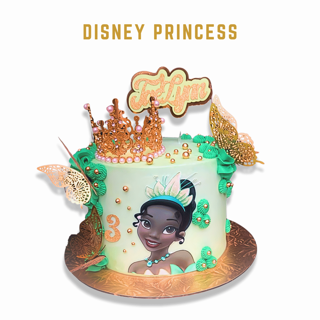Cake It or Leave It Tampa decorated Tiana birthday cake with a crown, butterfly accents, and a large edible image of Tiana from Disney on the front. Gold and green accents with a "Disney Princess" sign on top.