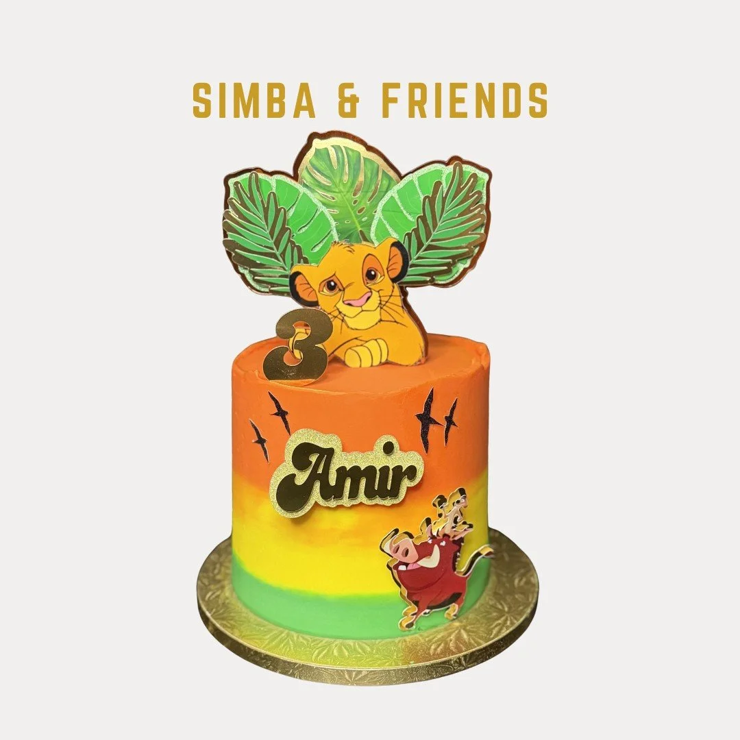 Simba and Friends is a colorful birthday cake with The Lion King theme, featuring a Simba topper, a zebra, and leaf decorations, with the name Amir and the number 3