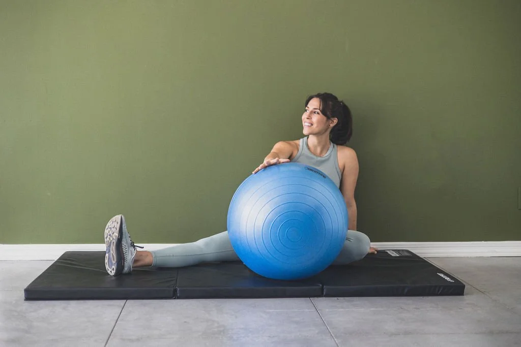 bella benjamin physical therapist with physioball for stability exercises