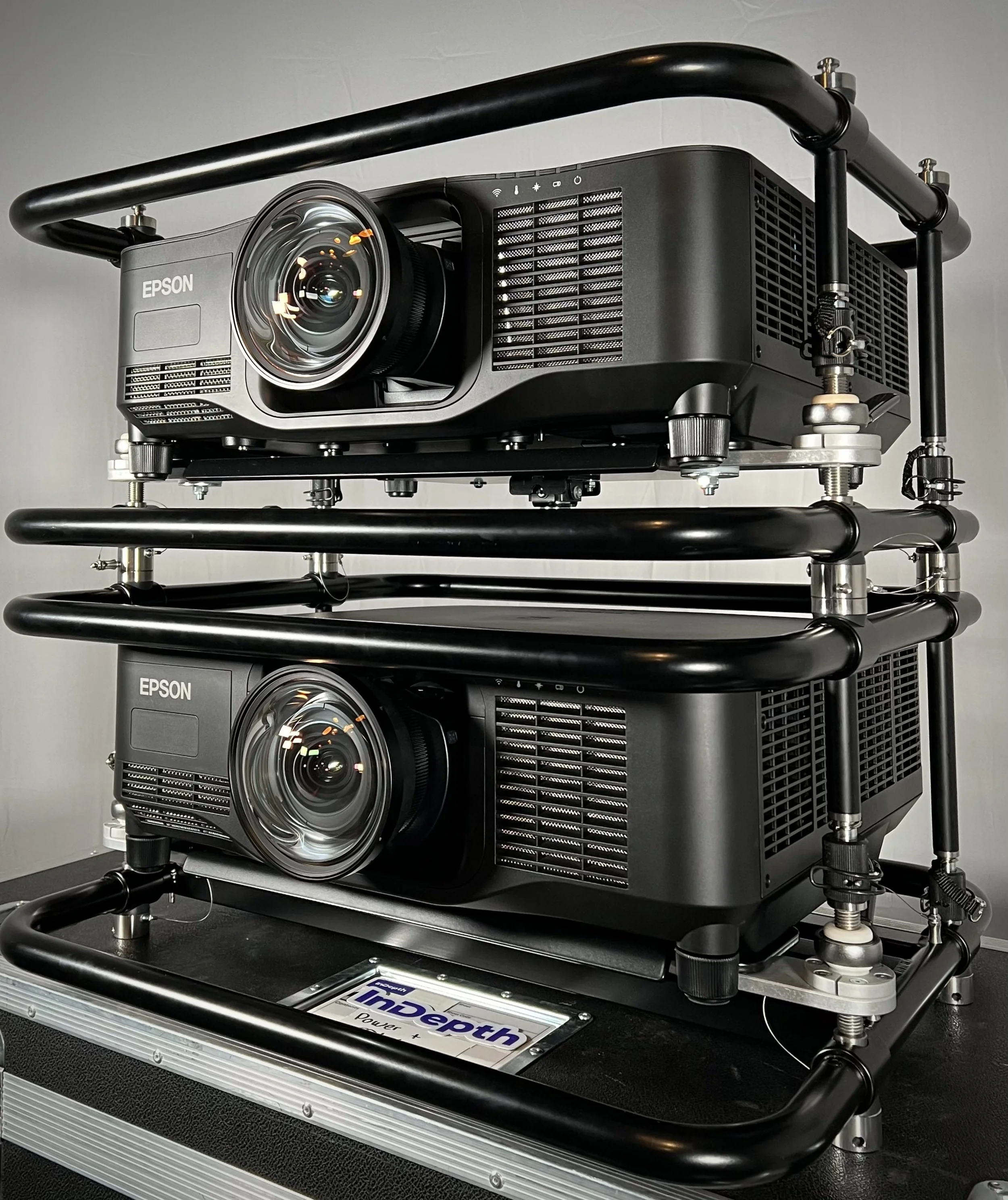 Double-stacked Epson projectors in a black rig, ready for large-scale projection mapping installations