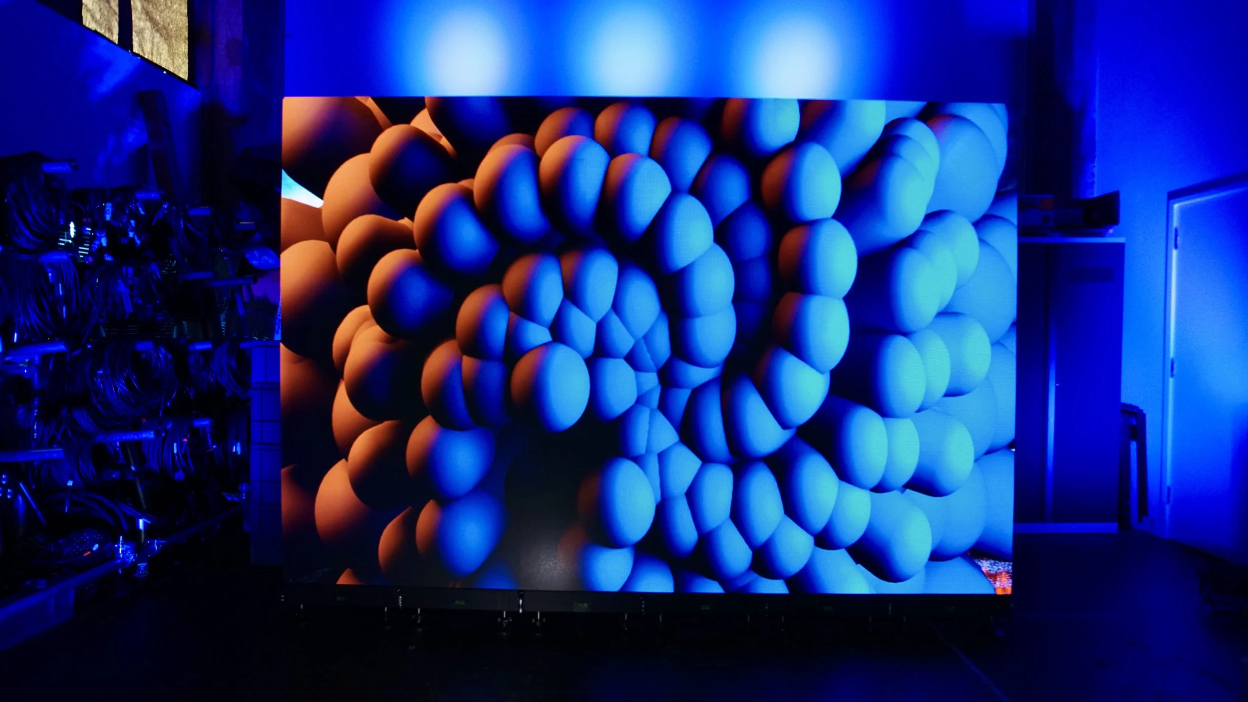 2.9mm indoor LED video wall displaying high resolution abstract content