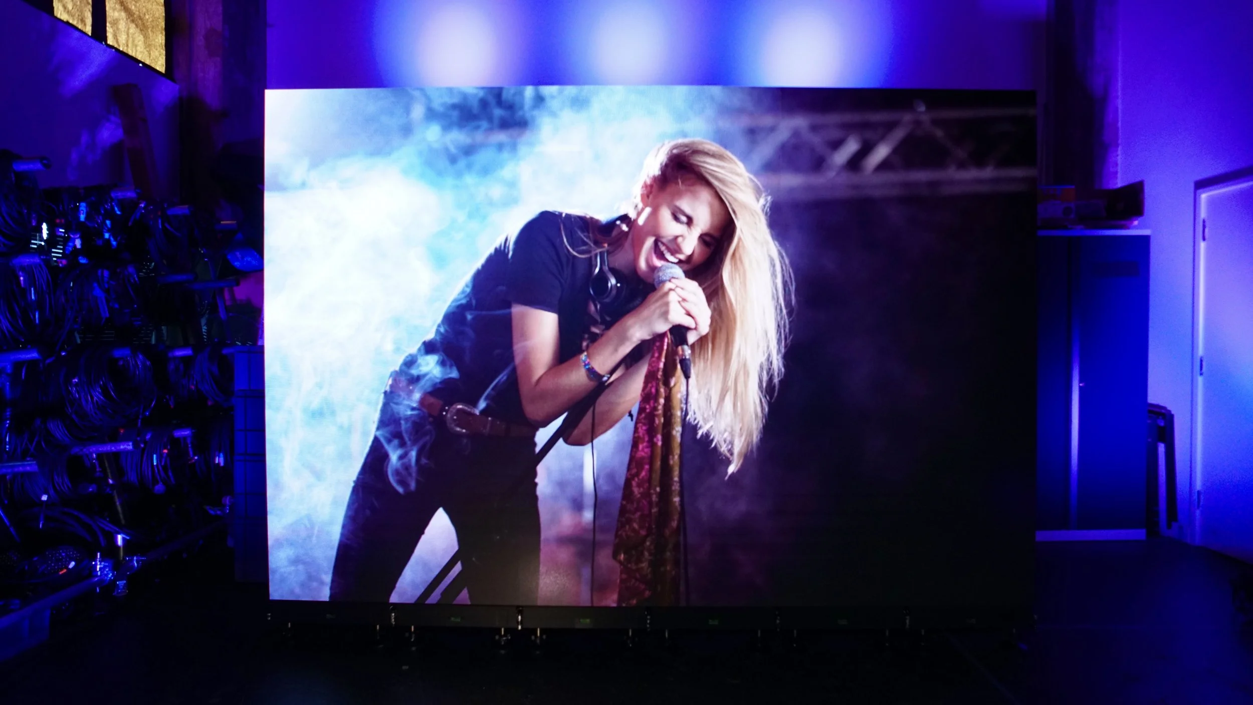 Indoor LED video wall displaying live music performance content