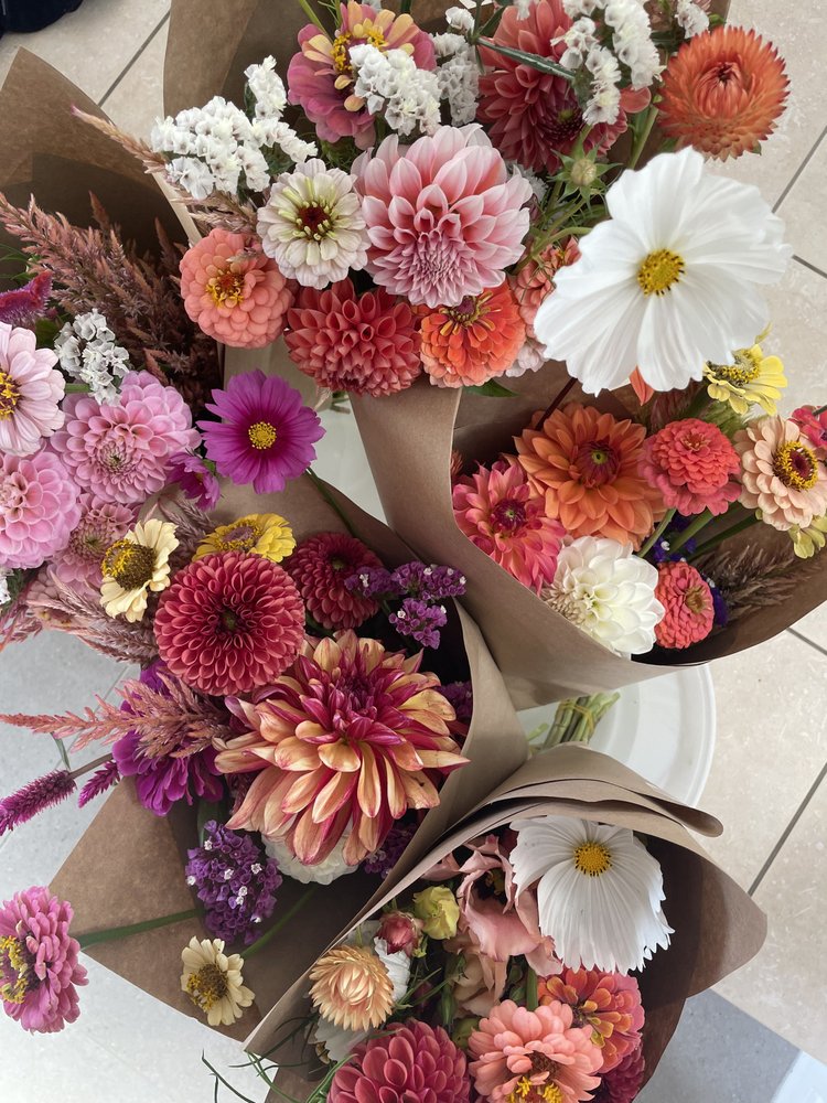 Bouquets wrapped in brown paper