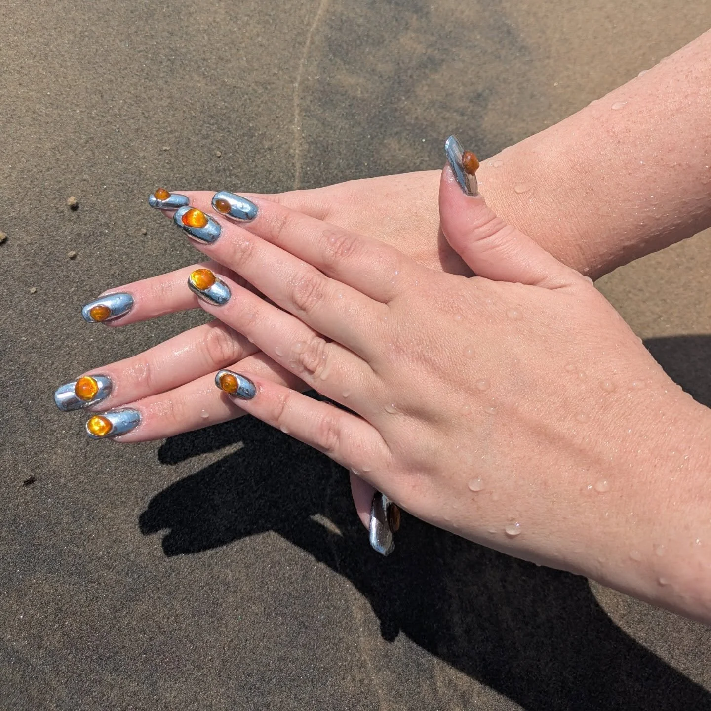 Globby chrome claws for @bao_sophie! This is my first time doing extensions on not my own hands. Nail design  based on a @nailsinurcoffin set with tutorial by @necta_nails