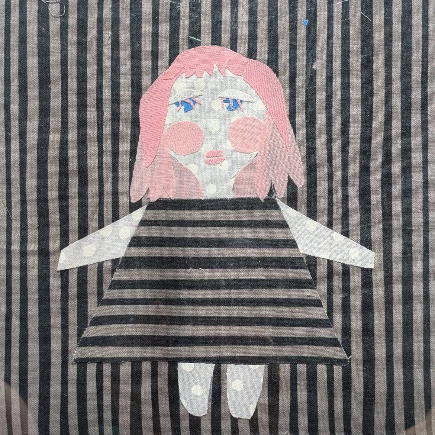 Little (self portrait??) fabric paper doll (made during @queer.quilting.chi iron on patch workshop)