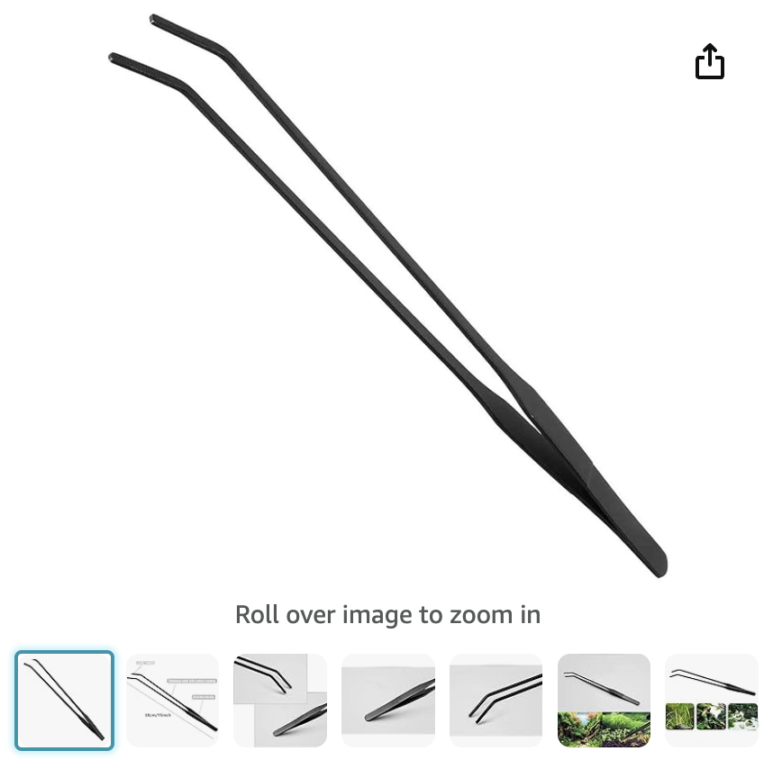 Black metal feeding tongs