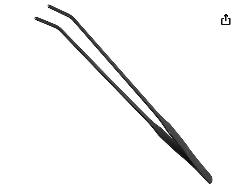 Black metal feeding tongs