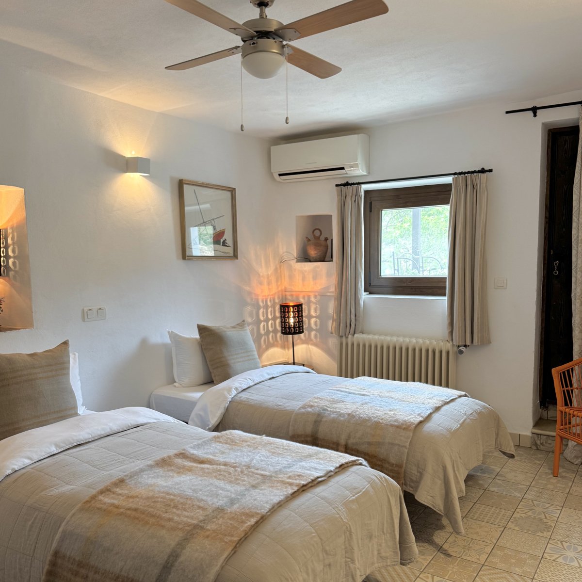 Almond-Hill-House-Andalucia-ORANGE-bedroom-twin-beds-square.jpeg