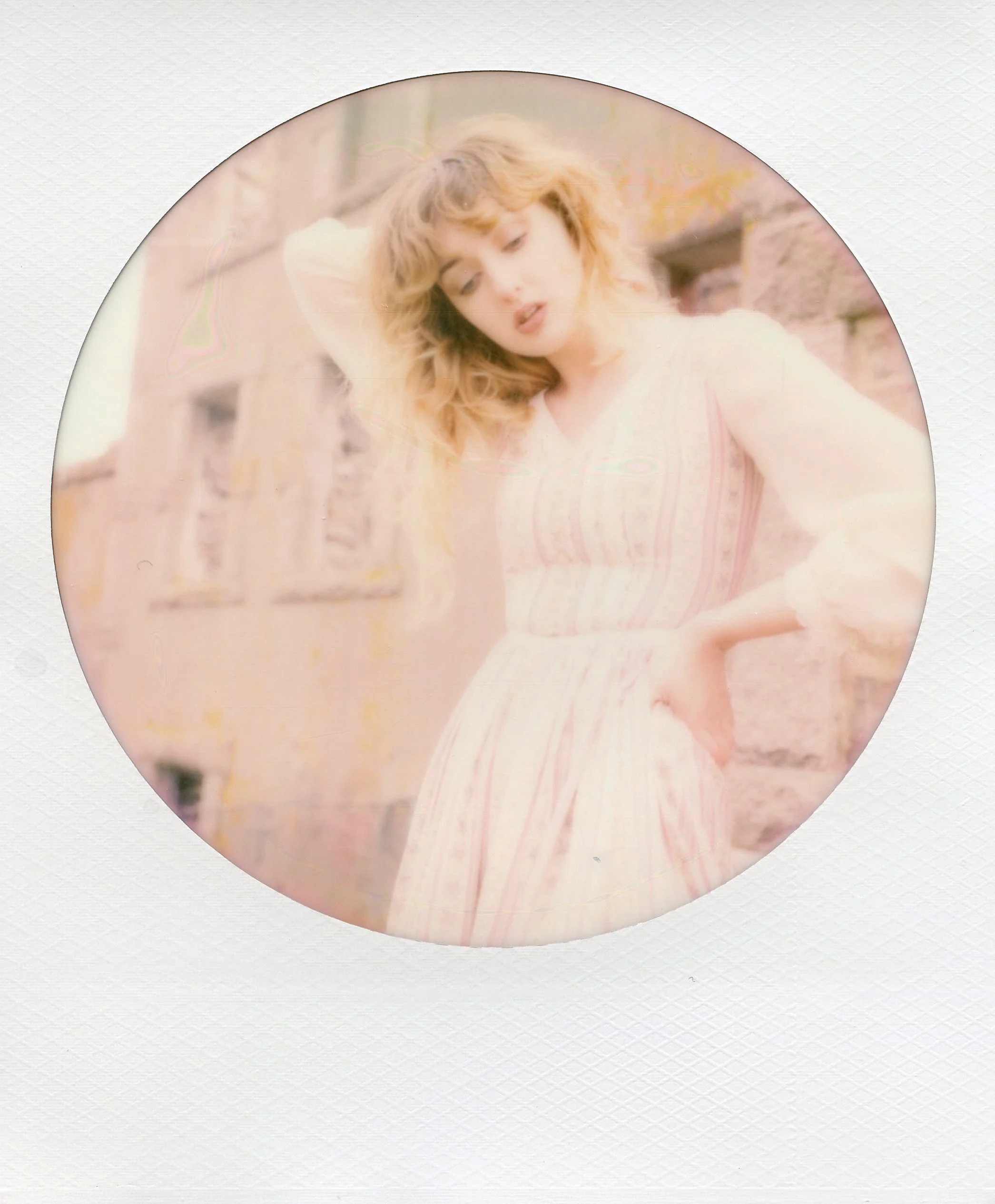 Model posing for a polaroid 