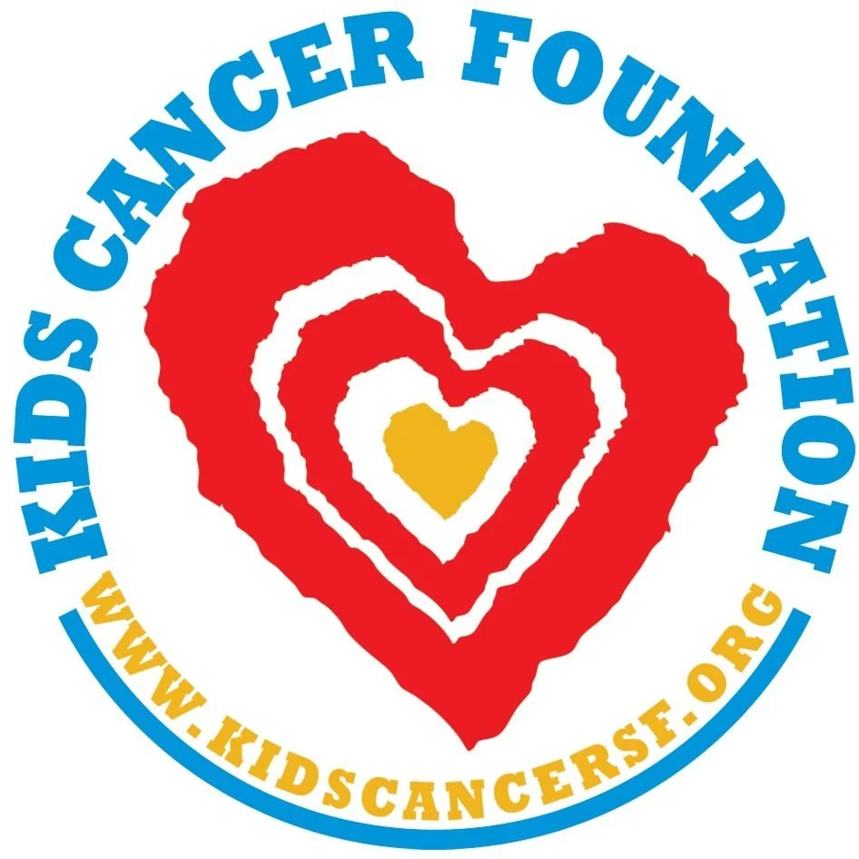 Logo of Kids Cancer Foundation with a stylized heart made of red, white, and gold outlines, encircled by the organization's name and website in blue and yellow text.