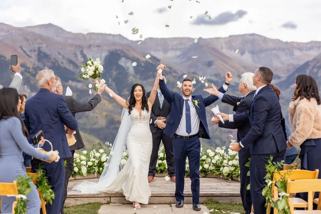 Guests throw petals at Bride and Groom after ceremony at San Sophia Overlook