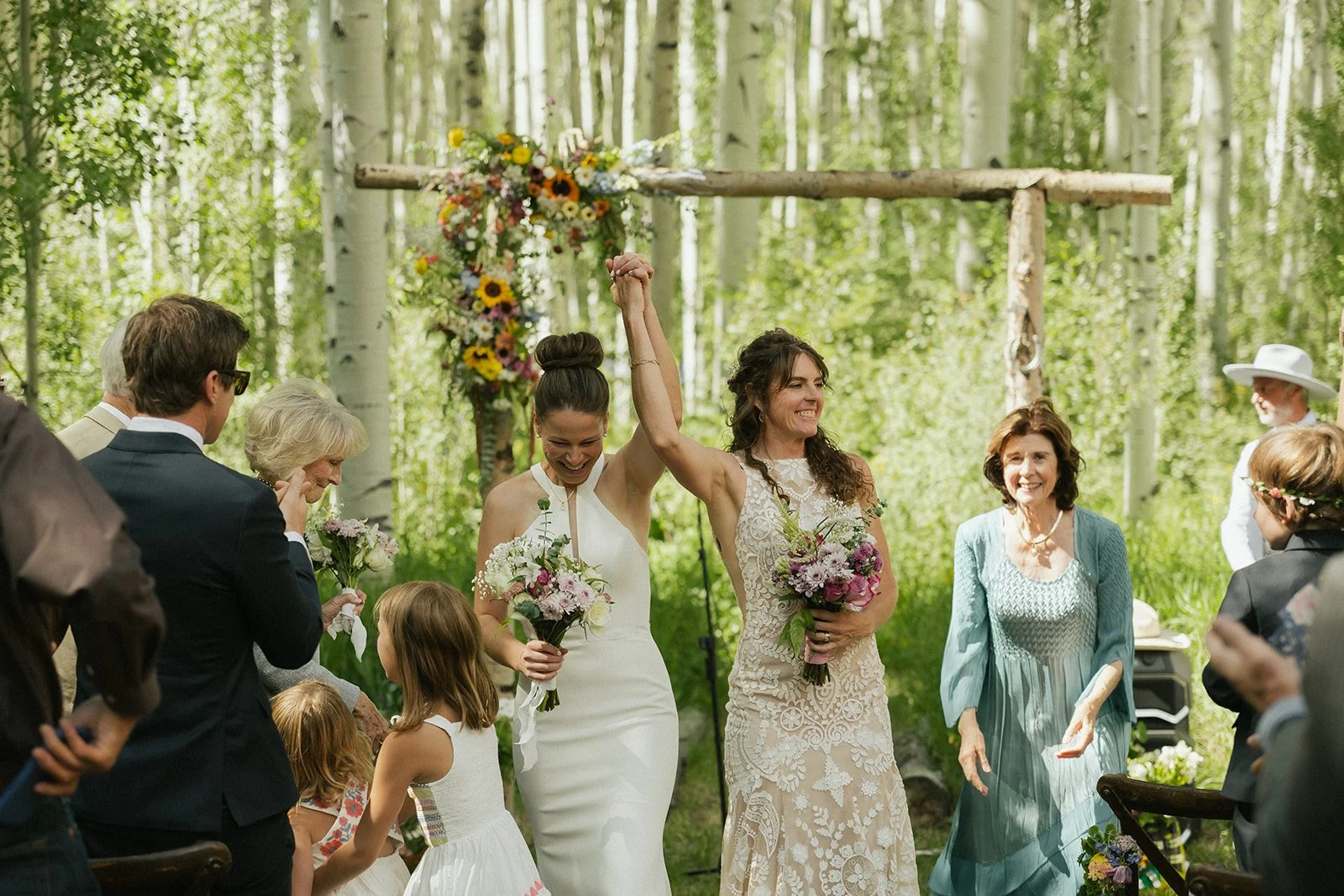 Mountain wedding ceremony with arbor