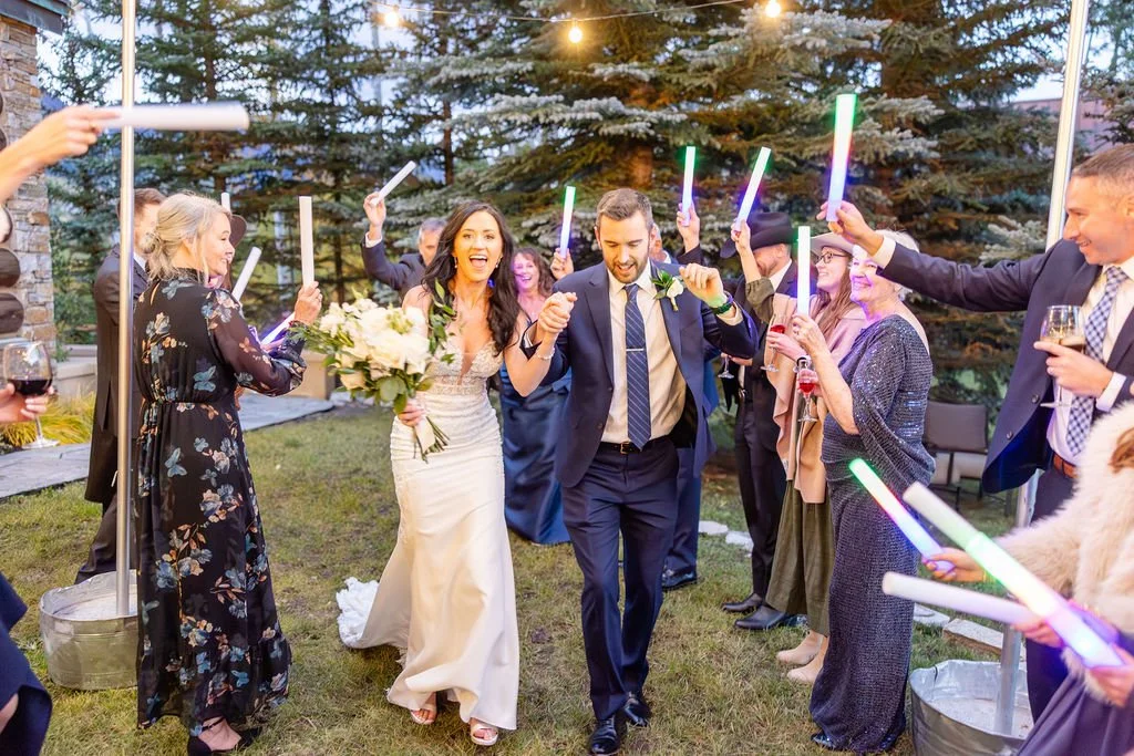 Bride and groom grand entrance on the backyard dance floor 
