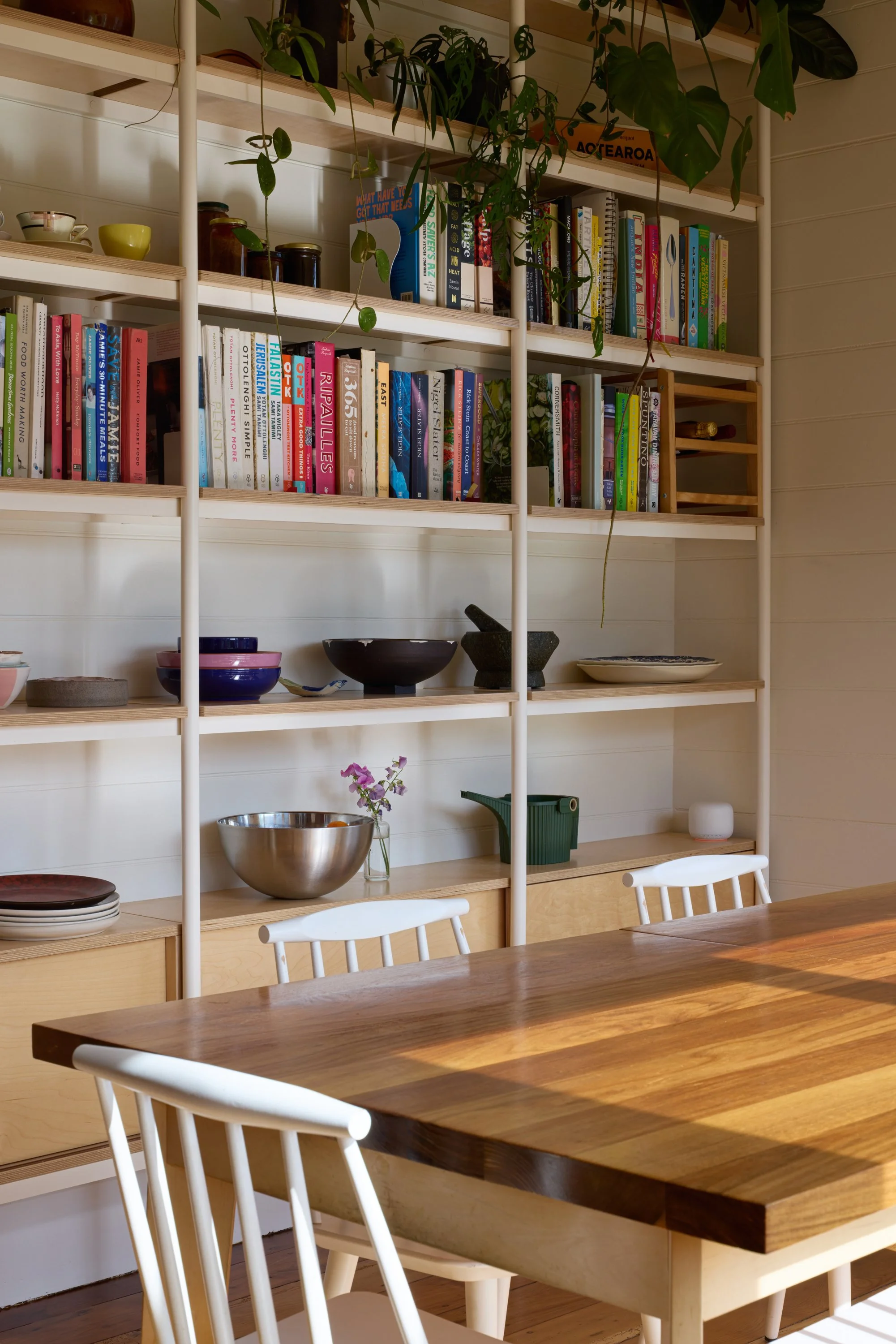 Custom built-in shelving integrated into the interior architecture as part of a residential renovation.