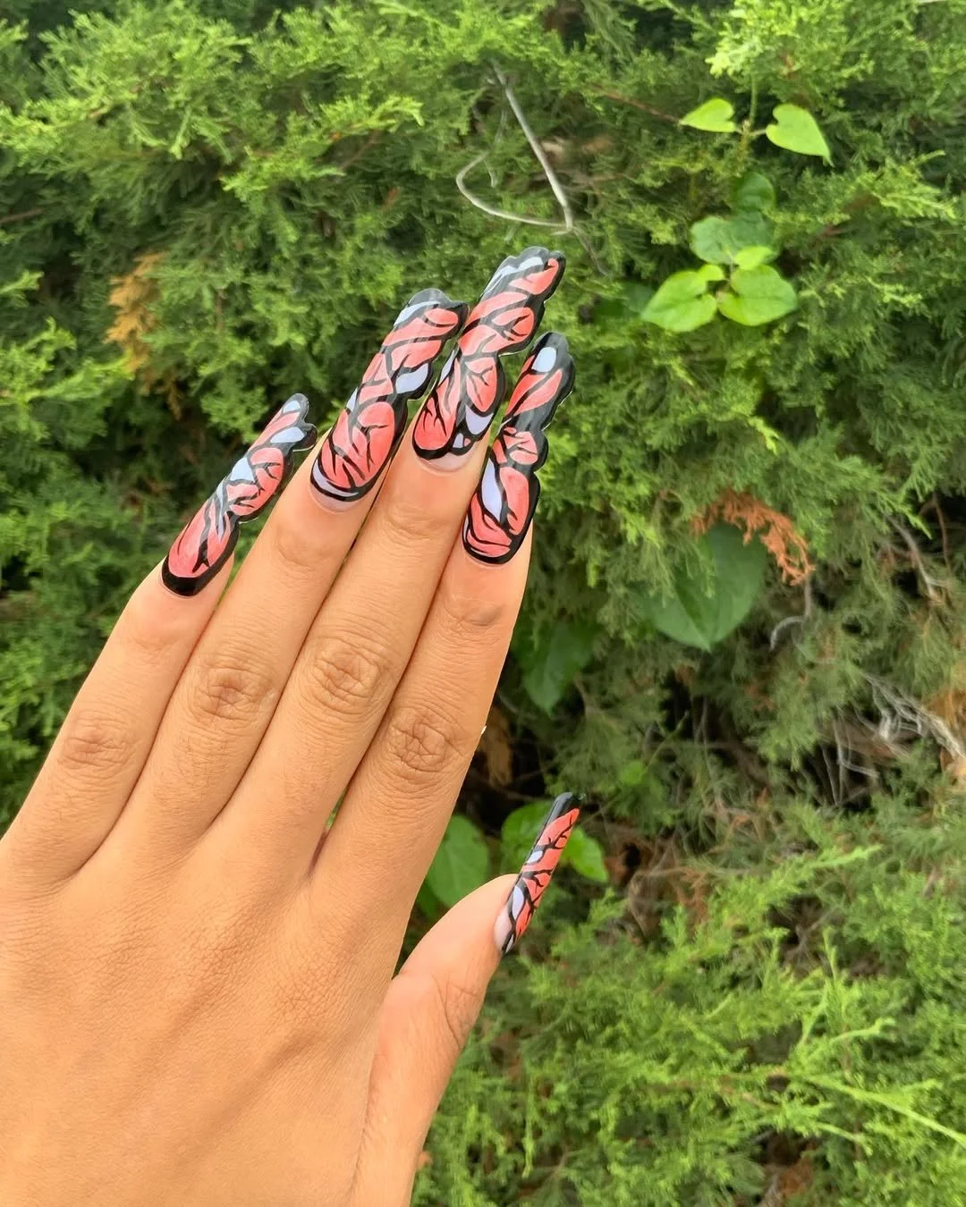 2 Carved Butterfly Nails .JPG