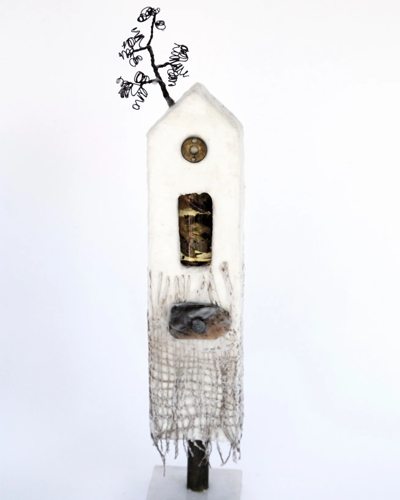 Its Warmer Within &ndash; Sculpture by Lyne Marshall

110 &times; 410 &times; 100 mm | Encaustic Wax &amp; Mixed Media

Part of a collection of three sculptural houses, this work imagines a village where intuition and opinions are valued, and all occ