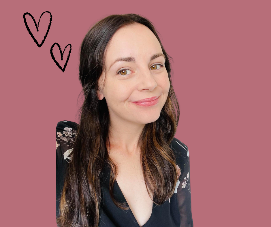 smiling female business owner portrait on pink background beside two hand-drawn hearts