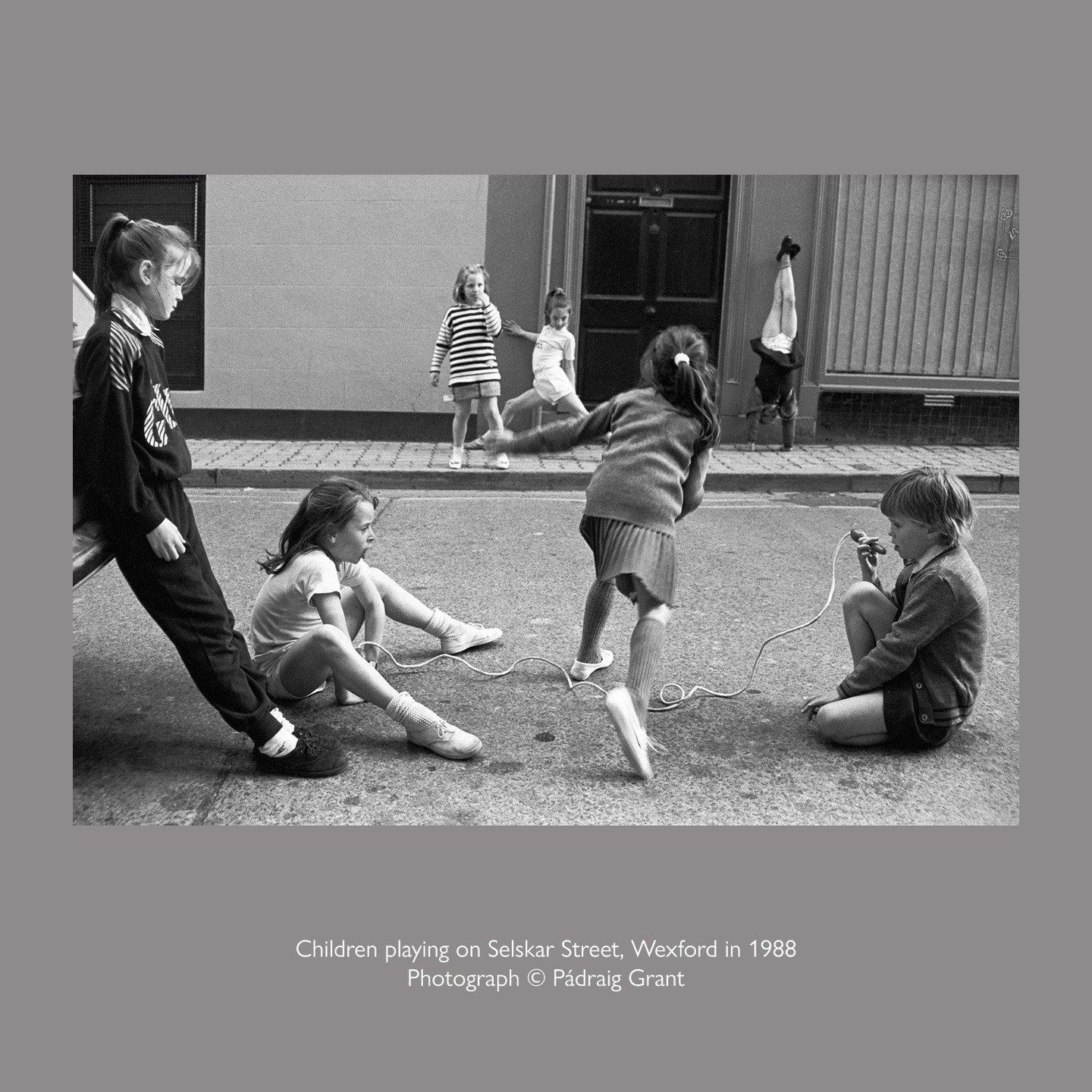 Children playing on Selskar Street, Wexford in 1988
Photo &copy; P&aacute;draig Grant

#padraiggrantswexford #streetphotography #filmphotography #blackandwhitephotography
