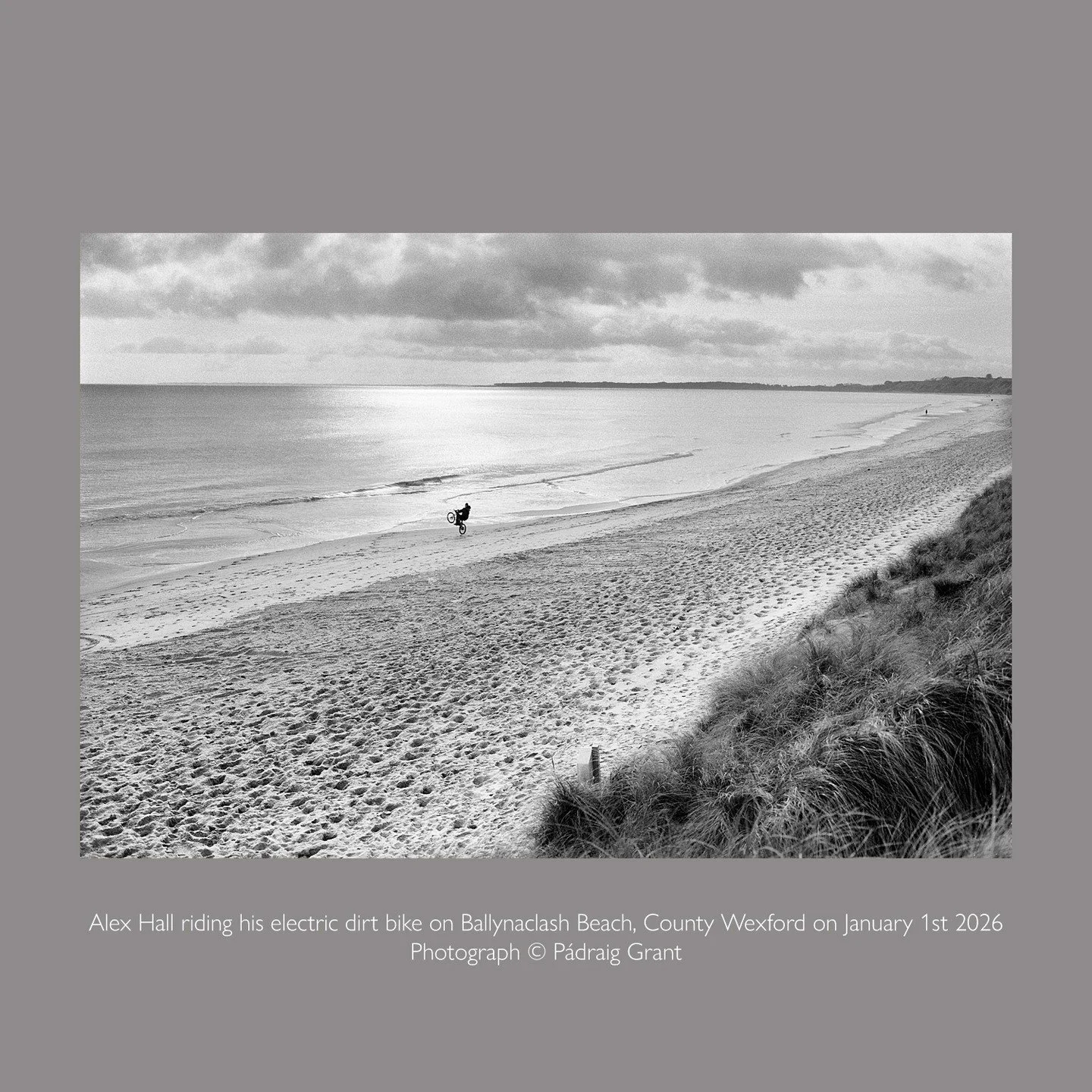 Alex Hall riding his electric dirt bike on Ballynaclash Beach, County Wexford on January 1st 2026

Photograph &copy; P&aacute;draig Grant
#padraiggrantswexford #wexfordcoast #filmphotography 
@alexhall087 
#linhof #kodaktrix400