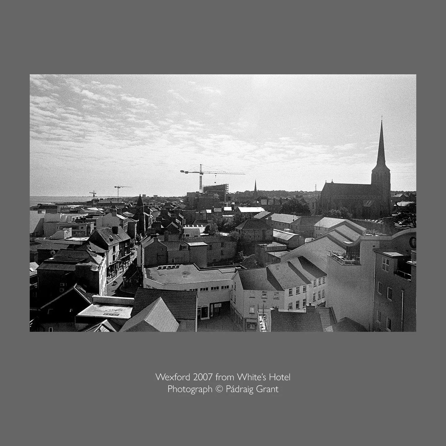 Wexford 2007 featuring the construction of the National Opera House and a detail shot of the "piazza" outside of the Allied Irish Bank on Main Street. 
Both shot in summer 2007. 

Photograph &copy; P&aacute;draig Grant
#padraiggrantswexford