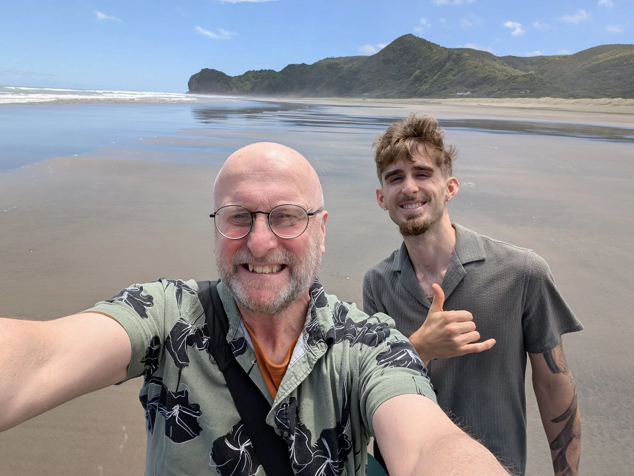 The squinty fellow, AKA Baldemort to some, on Piha Beach today with the young fellow. (The hat was off for picture making purposes only.) Happy days!!