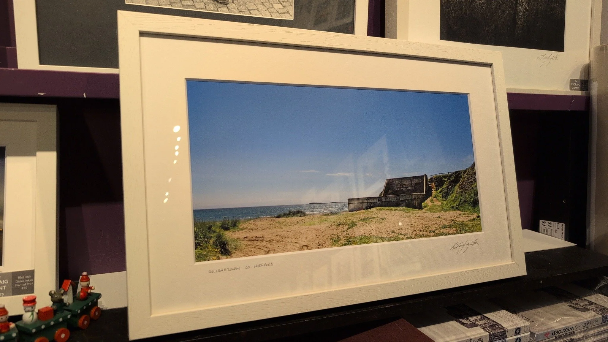 I spend my life on Wexford's astonishing and ever changing coastline. Over the years I have photographed every bay, strand, pier, inlet, estuary and beach! 

This, for example, is a photograph of Cullenstown's iconic beachside handball alley, and was