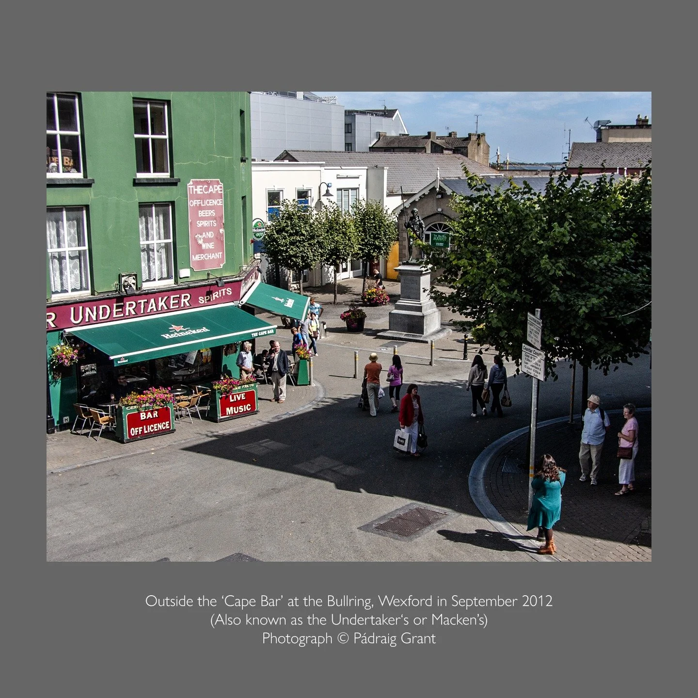One day the sun will return to Wexford but in the meantime here's a reminder of how it can be. 
Outside the &lsquo;Cape Bar&rsquo; at the Bullring, Wexford in September 2012
Also known, sometimes, as the Undertaker&lsquo;s or more usually simply as M