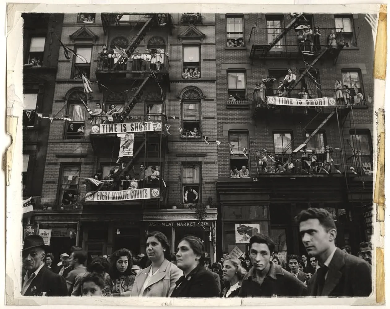 This is a great photograph by the legendary Weegee.
"Time is short", New York 1942