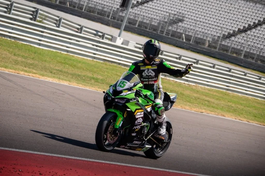 Luki Owen riding the Kawasaki ZX-6R Sportbike past the grandstands — 2026 season
