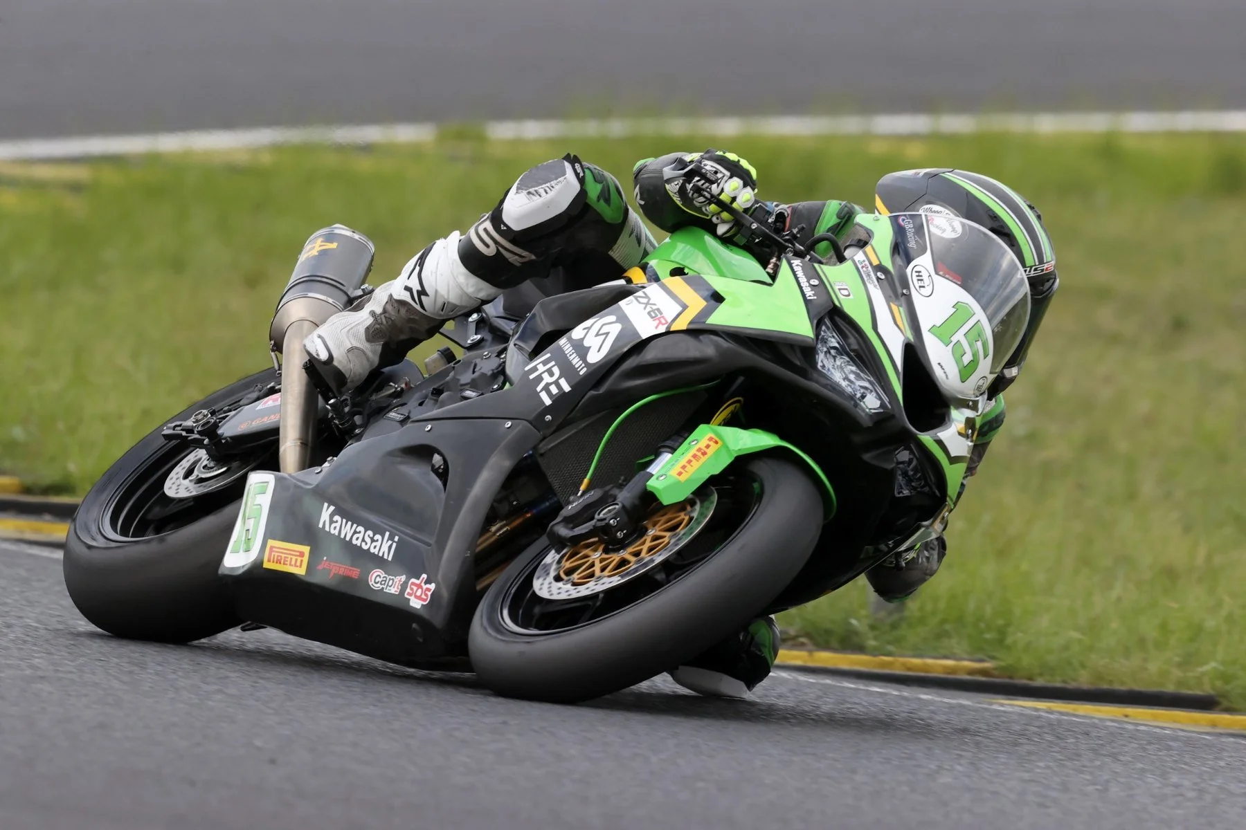 Number 15 Kawasaki ZX-6R Sportbike at full lean — Pannonia Ring pre-season test, April 2026