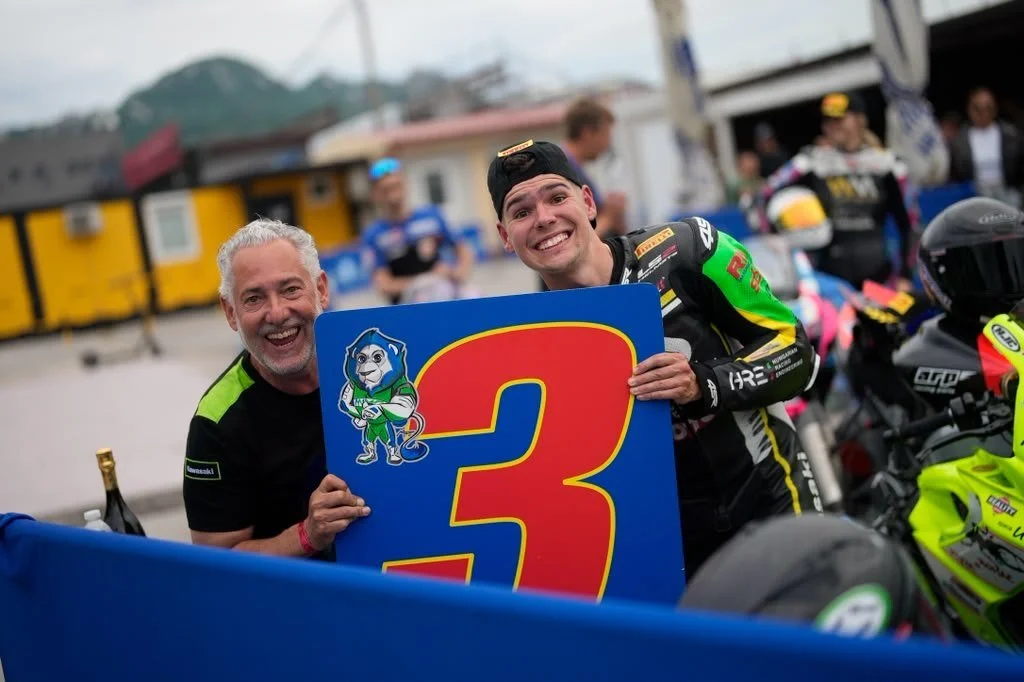Luki Owen and Max celebrating third place with the Minden Moto team — 2026 season