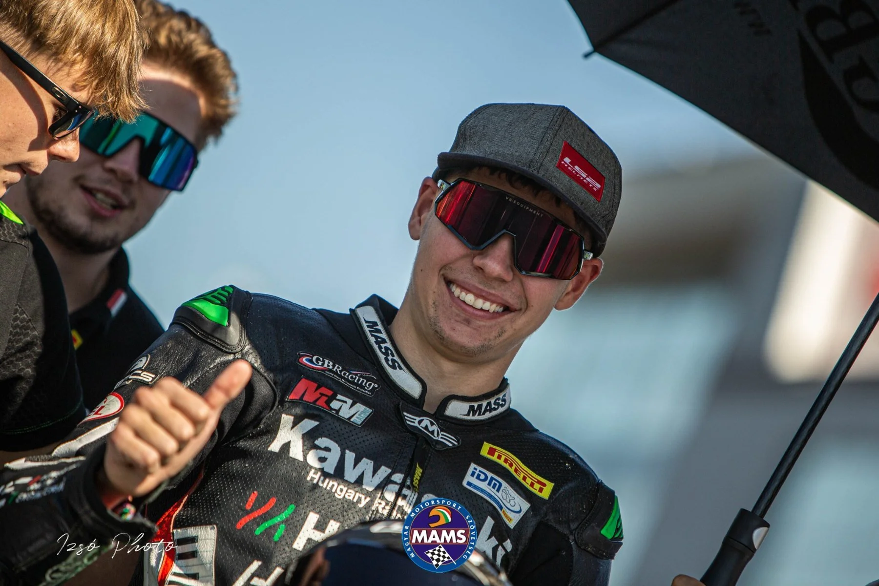 Luki smiling beside the team — AAIMC Slovakia Ring final round, SSP300 class