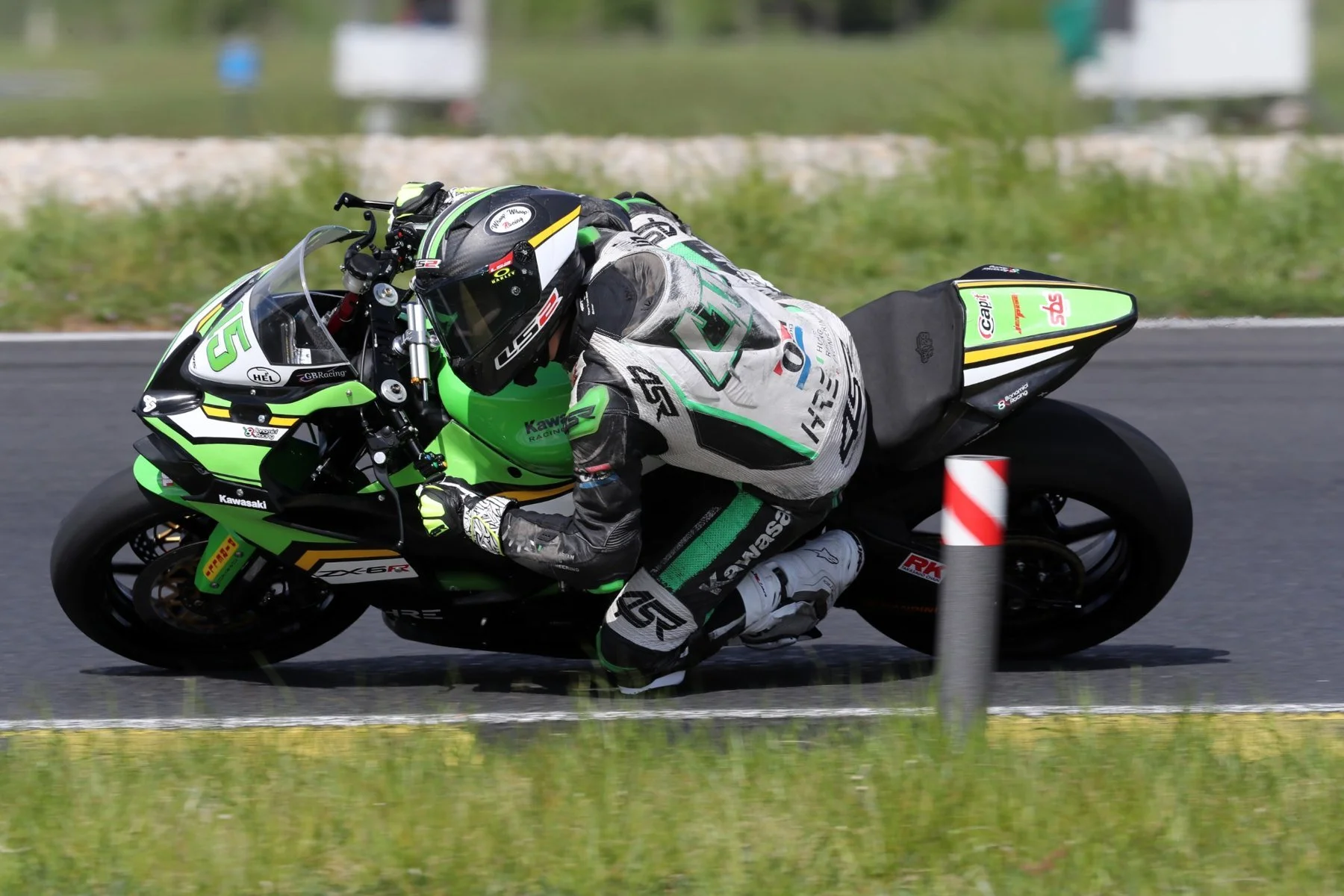 Luki Owen at full lean on the ZX-6R Sportbike — Pannonia Ring pre-season test, April 2026