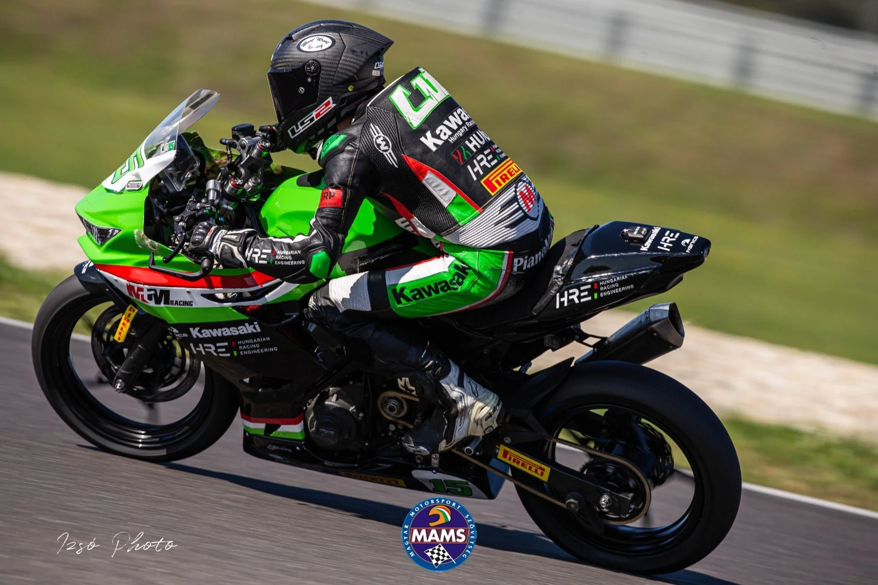Side view of Luki on the number 15 Kawasaki — AAIMC Slovakia Ring final round, SSP300