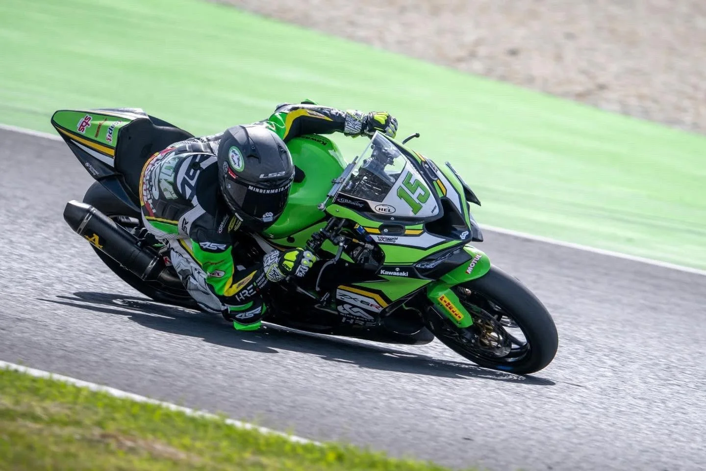 Luki Owen racing the green Kawasaki ZX-6R Sportbike beside the circuit runoff — 2026 season
