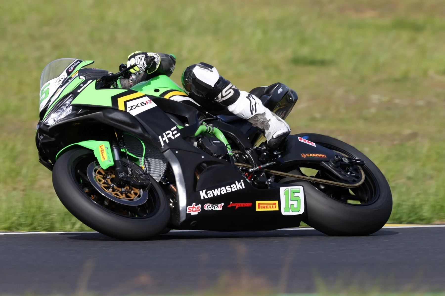 Luki Owen leaning the number 15 Kawasaki ZX-6R Sportbike through a corner — Pannonia Ring, April 2026