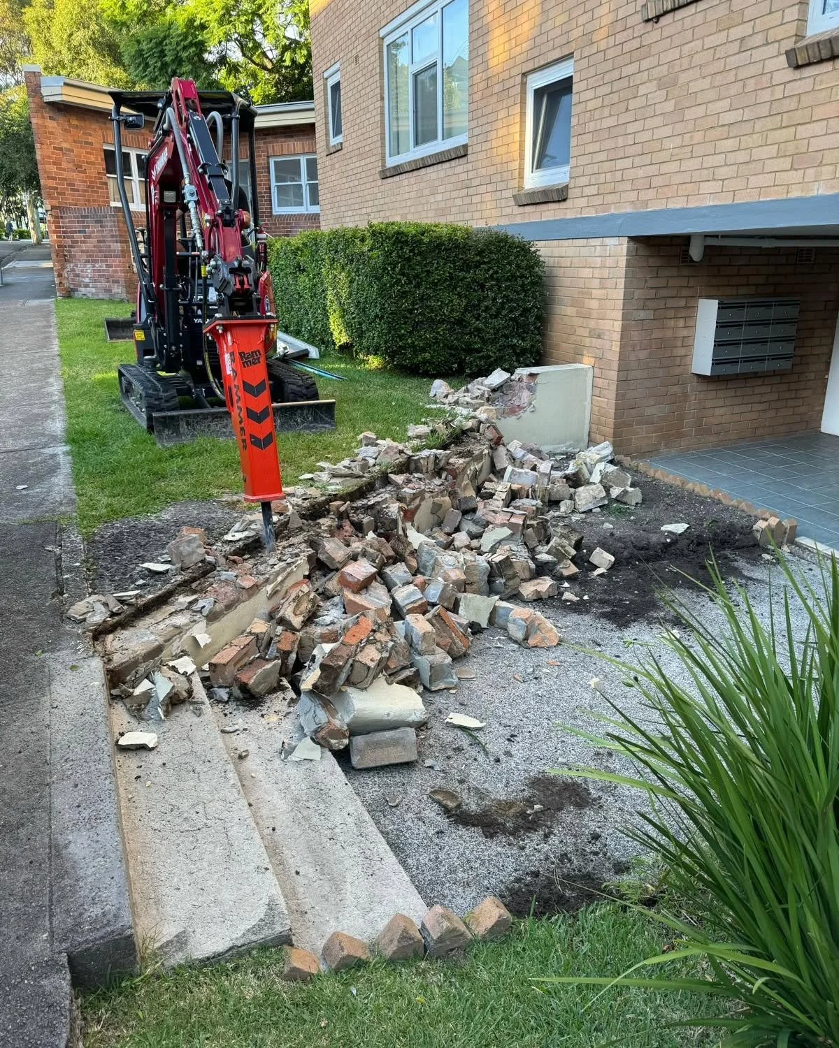Brick and concrete demo hammered out with the new Rammer Hammer.

Brick and concrete slab taken away and footings dug for new brick wall instalment.

@kgslandscaping

#excavation #civil #construction #earthmoving #Augar #retainingwalls #treeplanting 