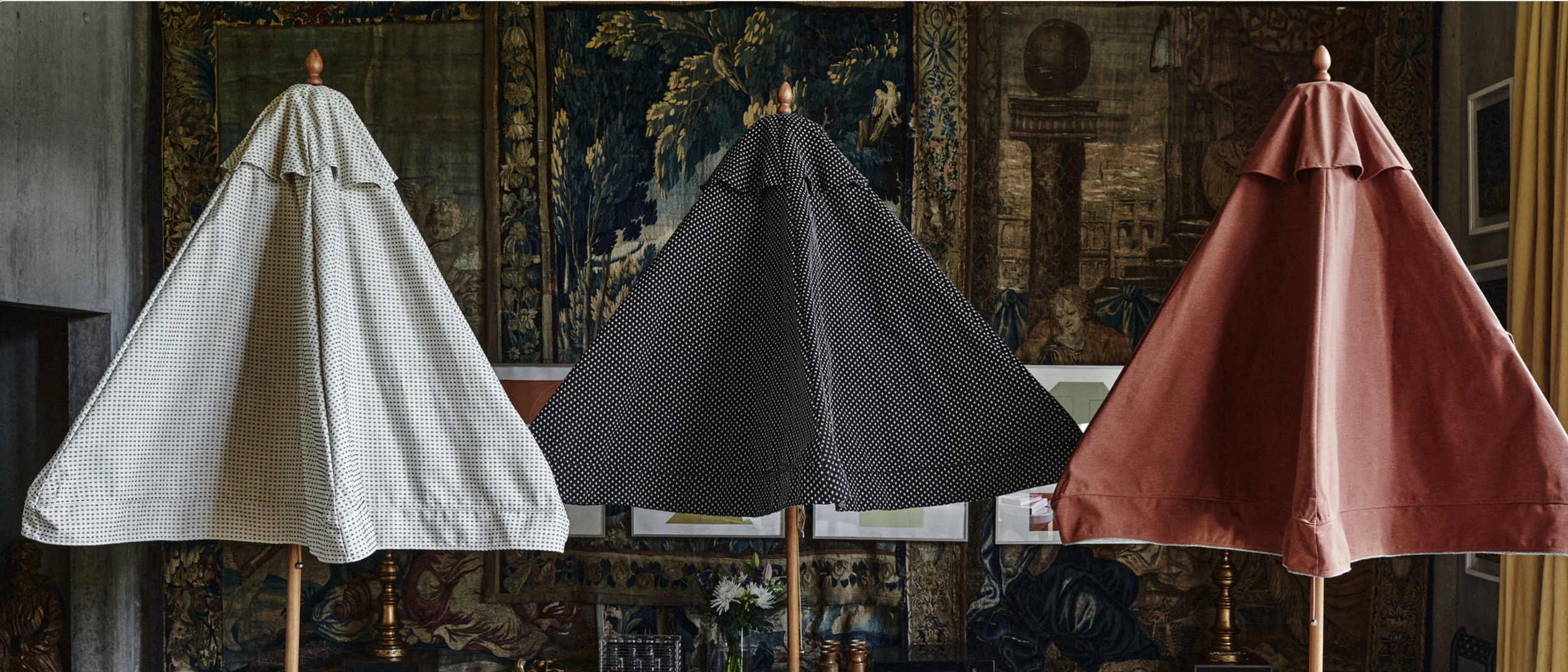 3 Plia Parasols in a line to showcase the PR success Pr dispatch brought to Plia Parasols