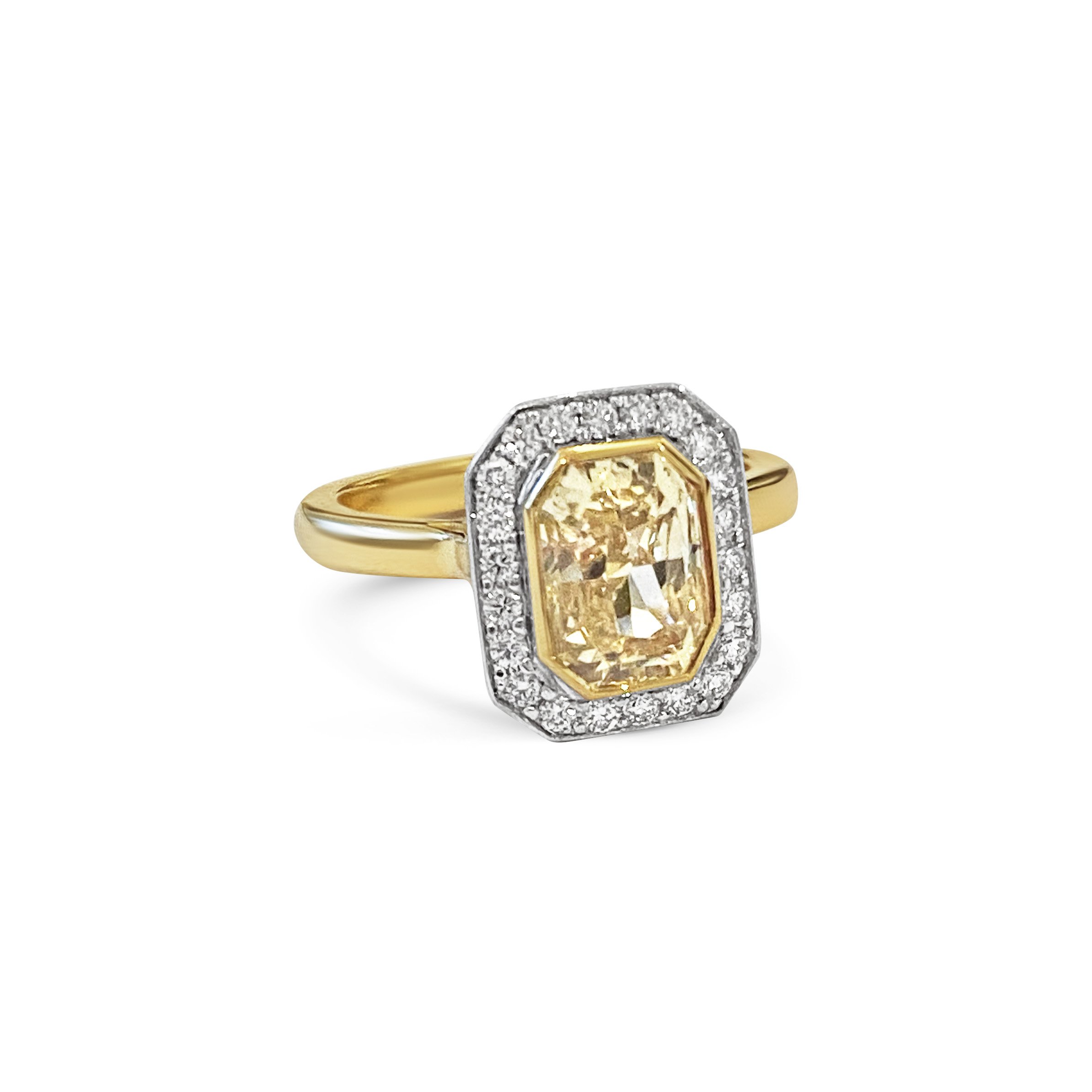 5) YELLOW SAPPHIRE AND DIAMOND HALO RING.jpg
