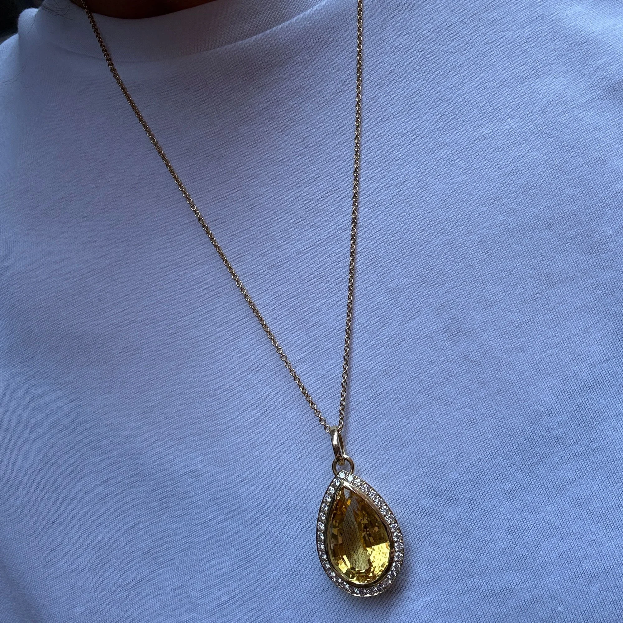 Citrine and diamond halo pendant