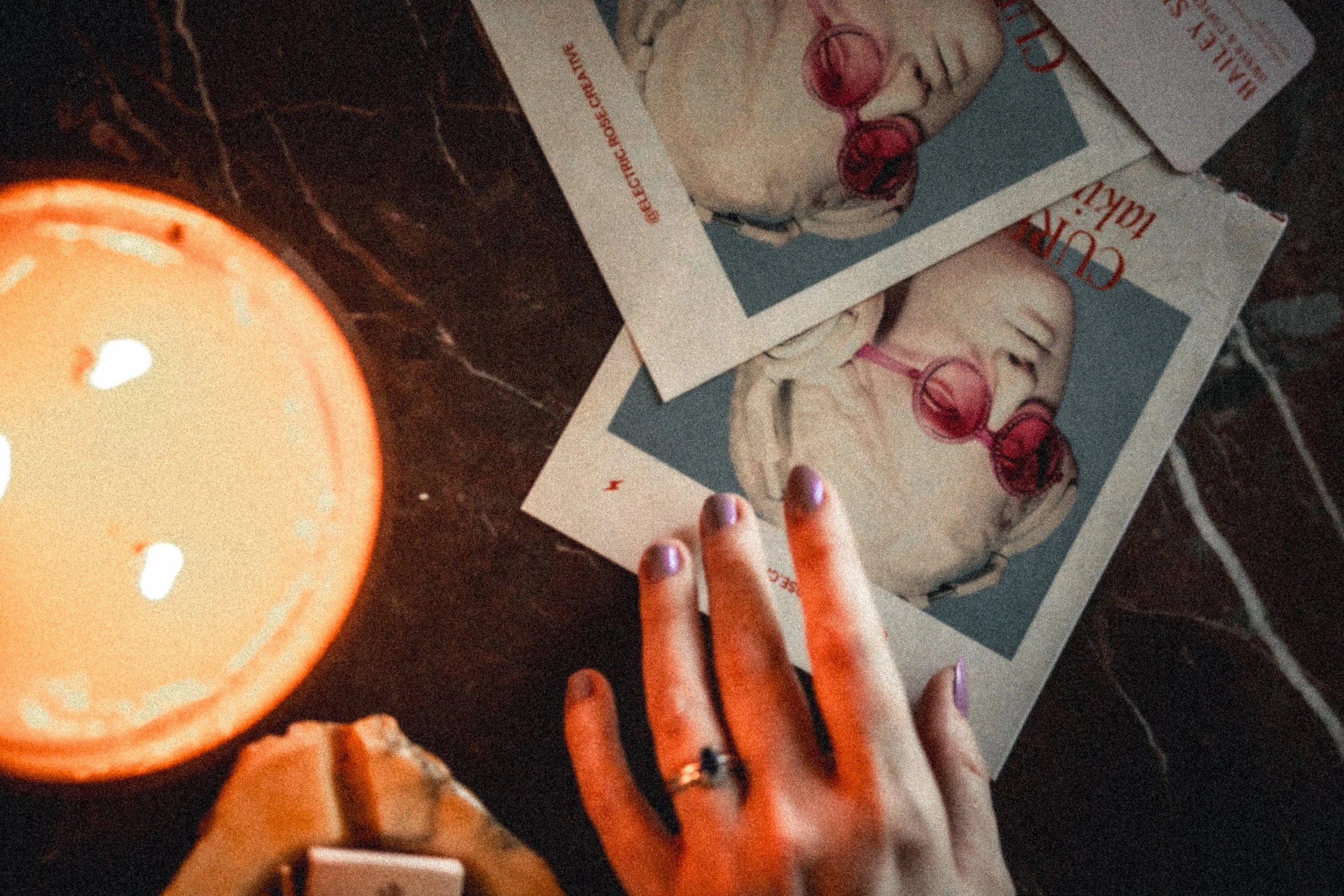 Electris Rose flatlay with action hand in the photo - based in Nashville, TN