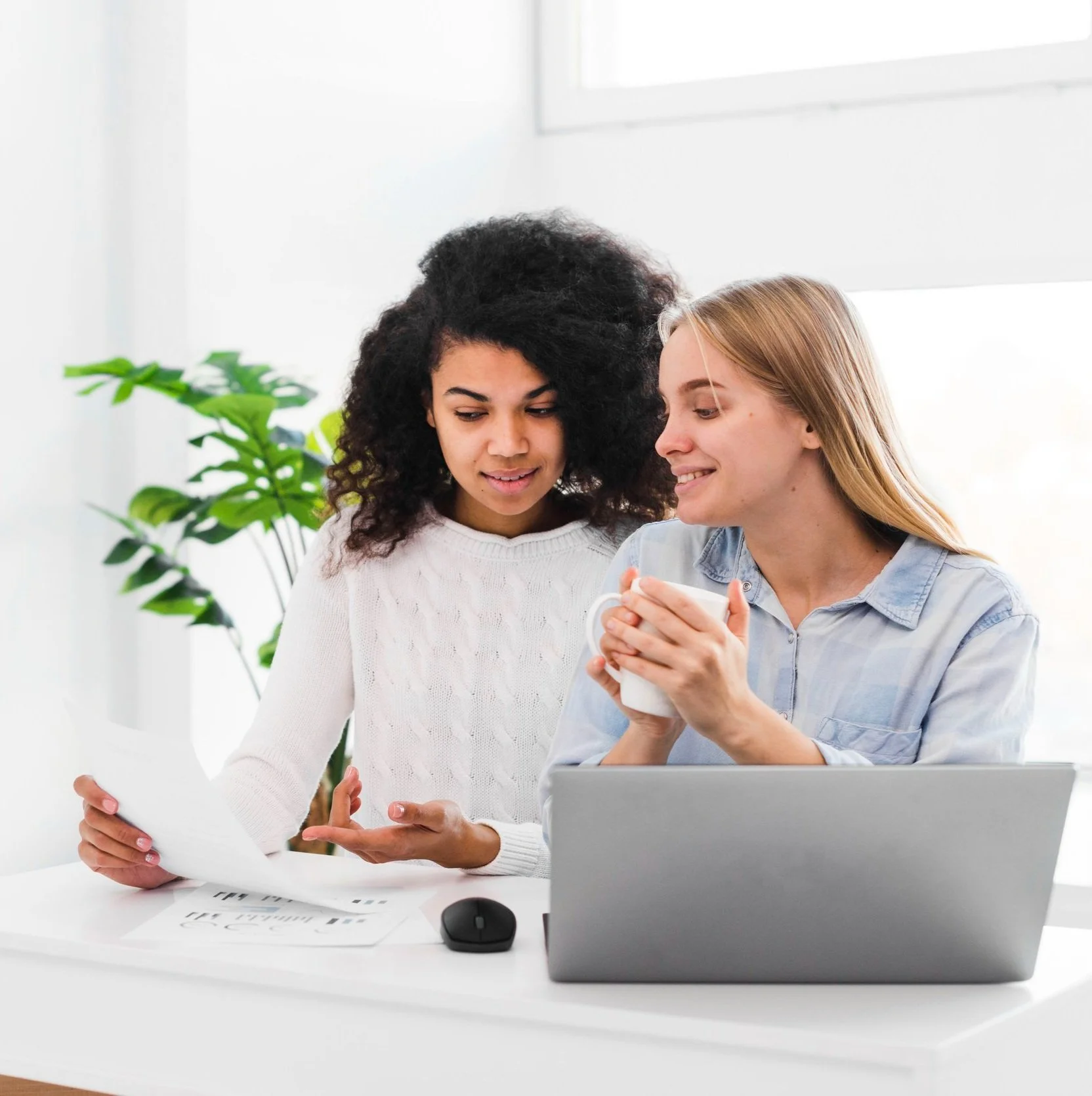 high-angle-females-team-meeting.jpg