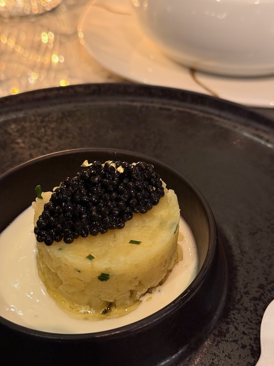 Marble &amp; Co - signature starter of crushed fingerling potatoes with Normandy butter and caviar 