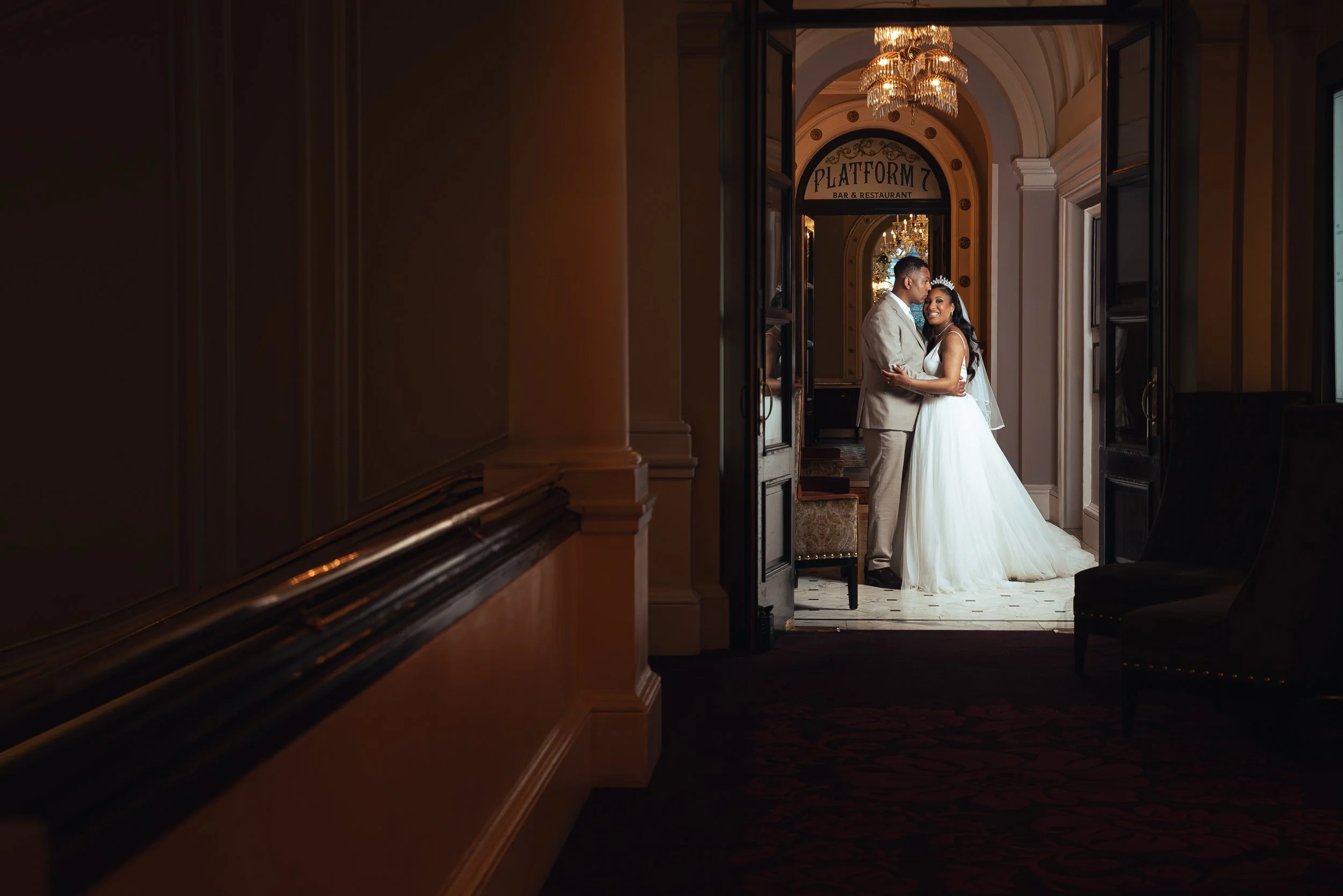 couple posing at the Clermont hotel in London